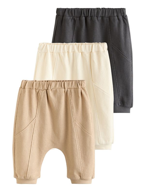 Next Next Hlače  boja devine dlake (camel) / crna / vuneno bijela