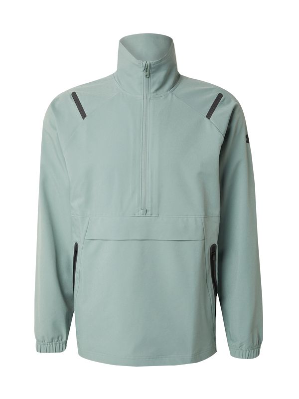 UNDER ARMOUR UNDER ARMOUR Sportska sweater majica 'Unstoppable'  pastelno zelena / crna