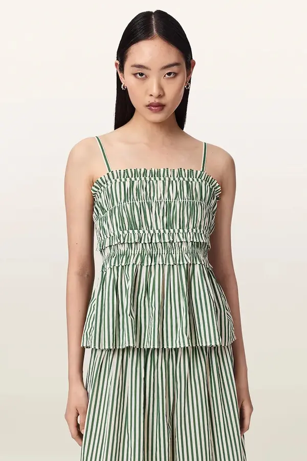 AllSaints AllSaints bluza s volanima za žene od pamuka KALI
