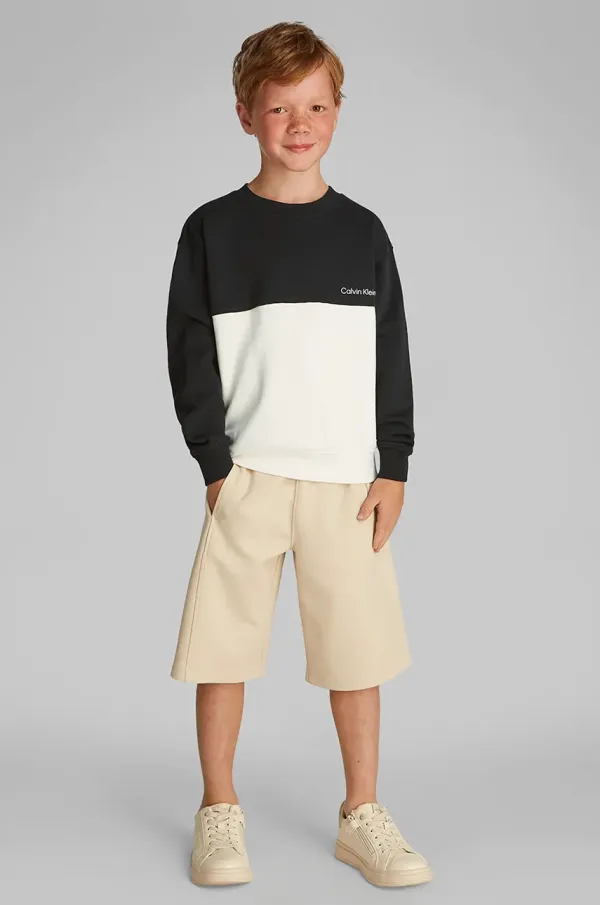 Calvin Klein Jeans Dječja pamučna dukserica Calvin Klein Jeans boja: crna, bez uzorka, IB0IB02470