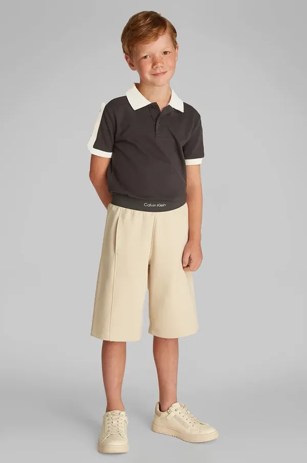 Calvin Klein Jeans Dječja polo majica Calvin Klein Jeans boja: crna, bez uzorka, IB0IB02485