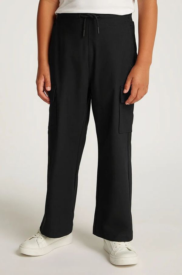 Calvin Klein Jeans Dječji donji dio trenirke Calvin Klein Jeans DRY KNIT SKATER boja: crna, bez uzorka, IB0IB02344