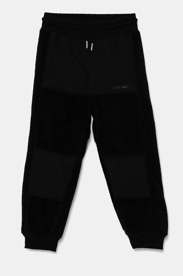 Calvin Klein Jeans Dječji donji dio trenirke Calvin Klein Jeans MIX MEDIA TEDD boja: crna, bez uzorka, IB0IB02196