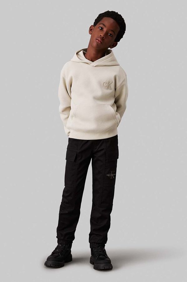 Calvin Klein Jeans Dječji donji dio trenirke Calvin Klein Jeans WOVEN CARGO boja: crna, bez uzorka, IB0IB02270