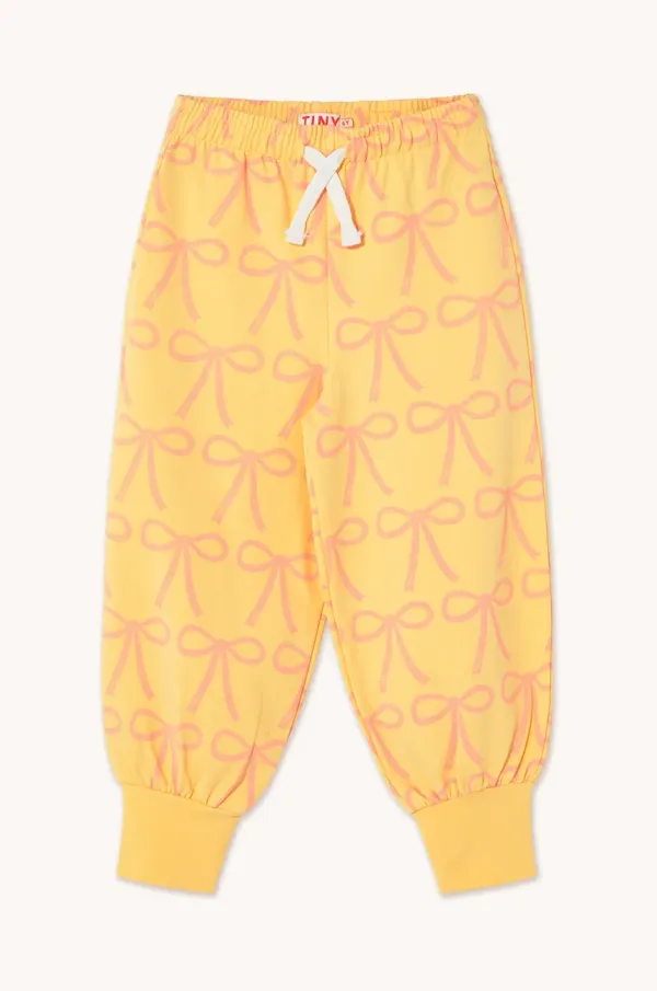 Tinycottons Dječji donji dio trenirke Tinycottons BOWS SWEATPANT boja: žuta, s uzorkom, SS25-057