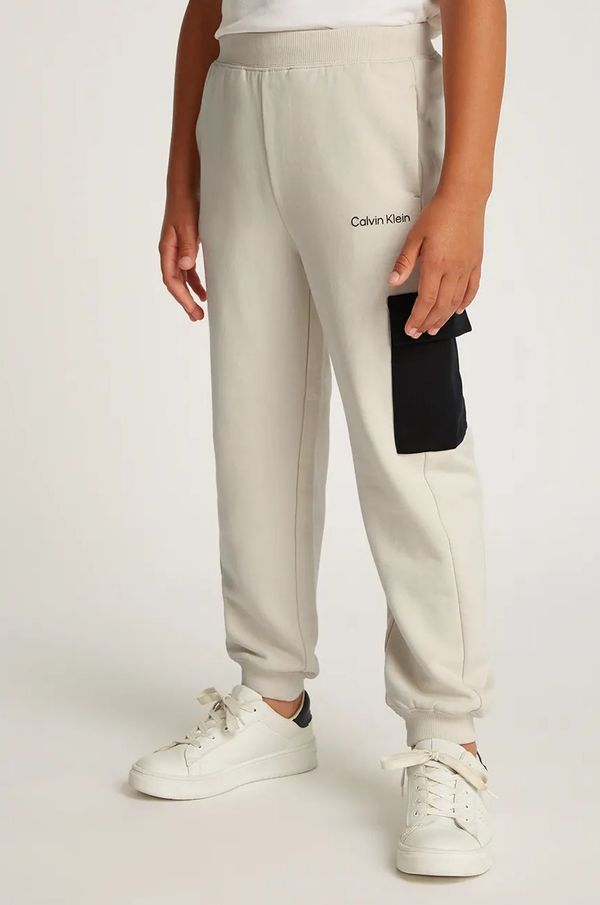 Calvin Klein Jeans Dječji pamučni donji dio trenirke Calvin Klein Jeans BLOCK CARGO boja: bež, bez uzorka, IB0IB02349