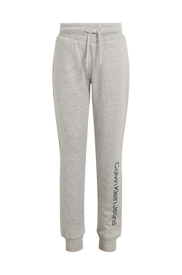 Calvin Klein Jeans Dječji pamučni donji dio trenirke Calvin Klein Jeans REGULAR JOGGER boja: siva, s tiskom, IU0IU00604