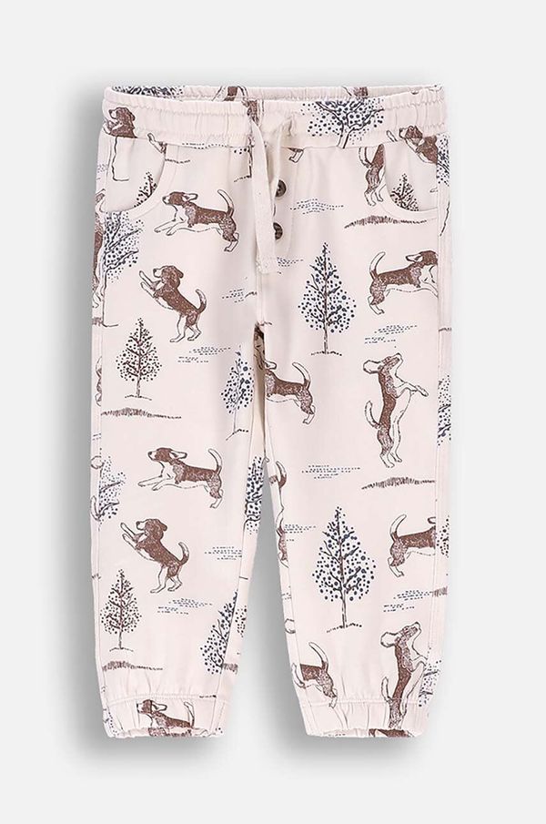 Coccodrillo Dječji pamučni donji dio trenirke Coccodrillo boja: bež, s uzorkom, FRIENDS TOGETHER BOY NEWBORN