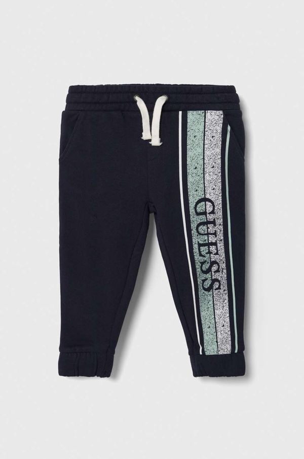 Guess Dječji pamučni donji dio trenirke Guess boja: tamno plava, s tiskom