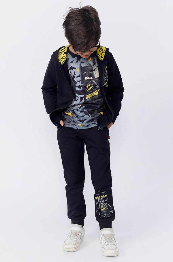 Lego Dječji pamučni donji dio trenirke Lego LWPHILO 601 boja: crna, s tiskom, 12011326