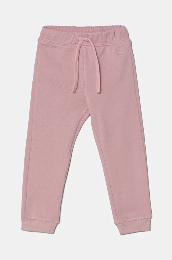 United Colors of Benetton Dječji pamučni donji dio trenirke United Colors of Benetton boja: ružičasta, bez uzorka, 3J70GF01N