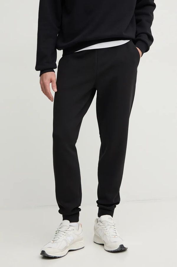 Lacoste Donji dio trenirke Lacoste boja: crna, bez uzorka, XH1776