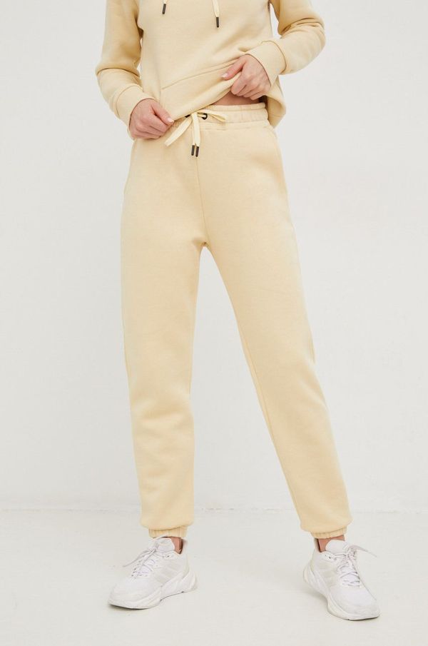 Peak Performance Donji dio trenirke Peak Performance za žene, boja: bež, glatki materijal