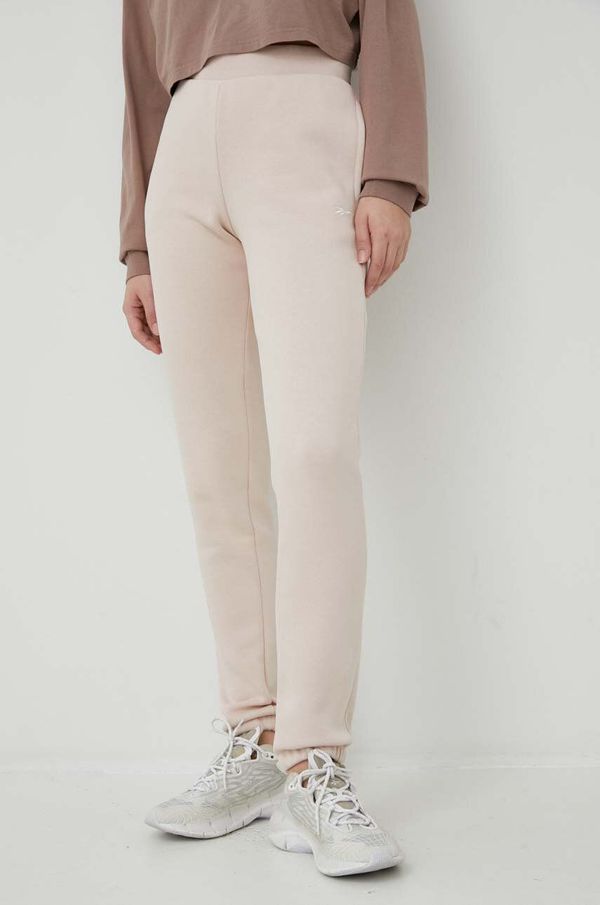 Reebok Donji dio trenirke Reebok boja: ružičasta, glatki materijal