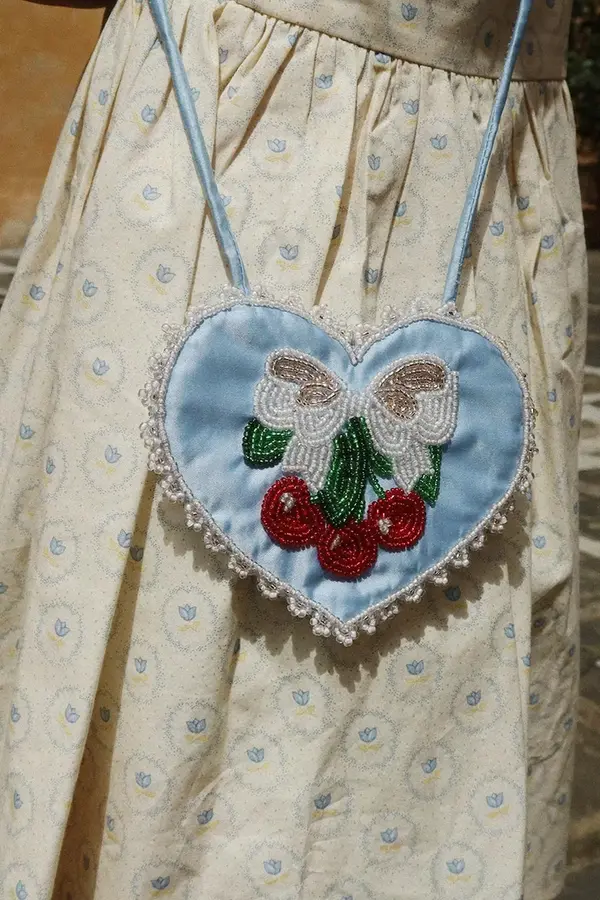 Konges Sløjd Konges Sløjd crossbody torba za djecu BEADED HEART MINI PURSE