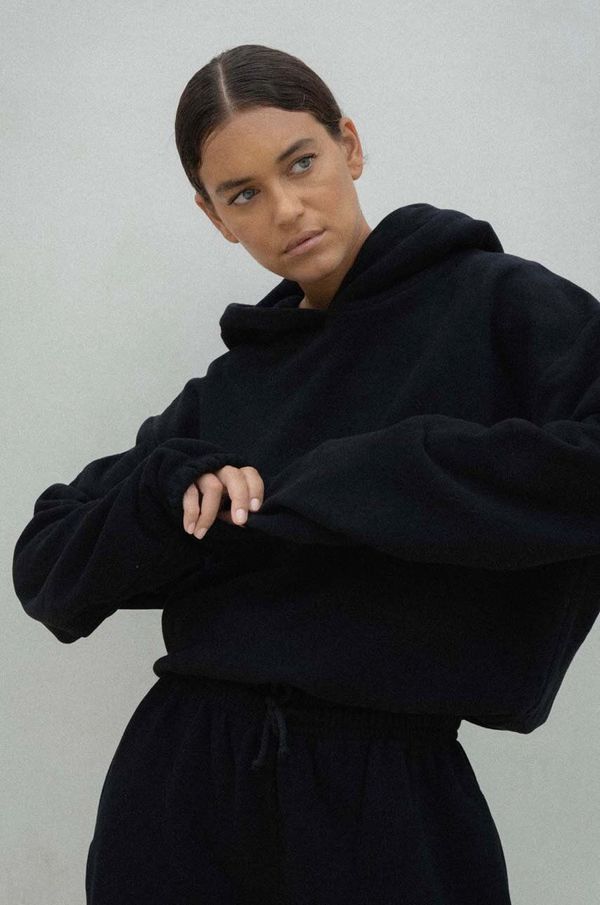 Muuv. Pamučna dukserica MUUV. SMOOTH COTTON za žene, boja: crna, bez uzorka