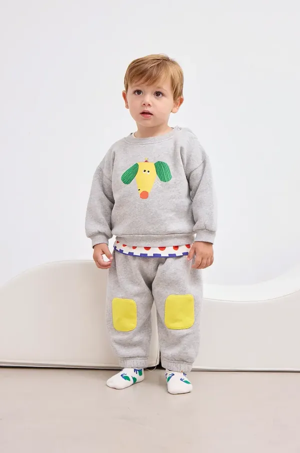 Bobo Choses Pamučna dukserica za bebe Bobo Choses Happy Dog boja: siva, s tiskom, 125AB029