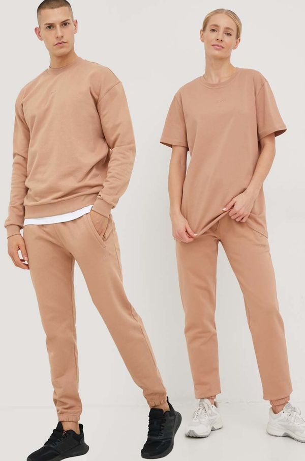 Arkk Copenhagen Pamučni donji dio trenirke Arkk Copenhagen unisex, boja: bež, glatki materijal