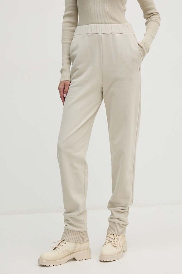 Calvin Klein Jeans Pamučni donji dio trenirke Calvin Klein Jeans boja: zelena, bez uzorka, J20J224443