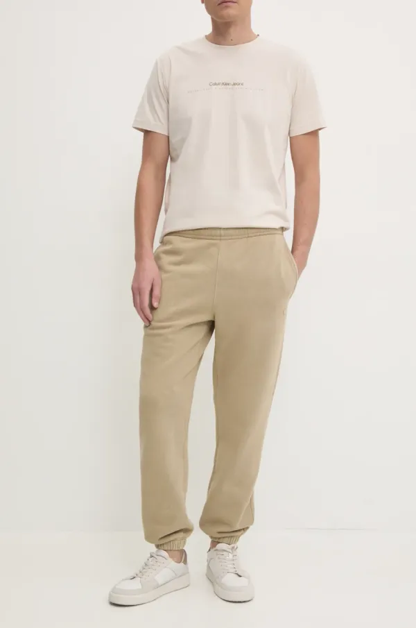 Lacoste Pamučni donji dio trenirke Lacoste boja: bež, bez uzorka, XH2852