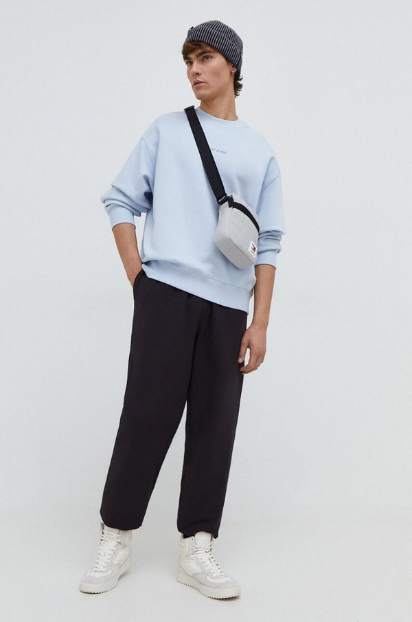 Tommy Jeans Pamučni donji dio trenirke Tommy Jeans boja: crna, bez uzorka