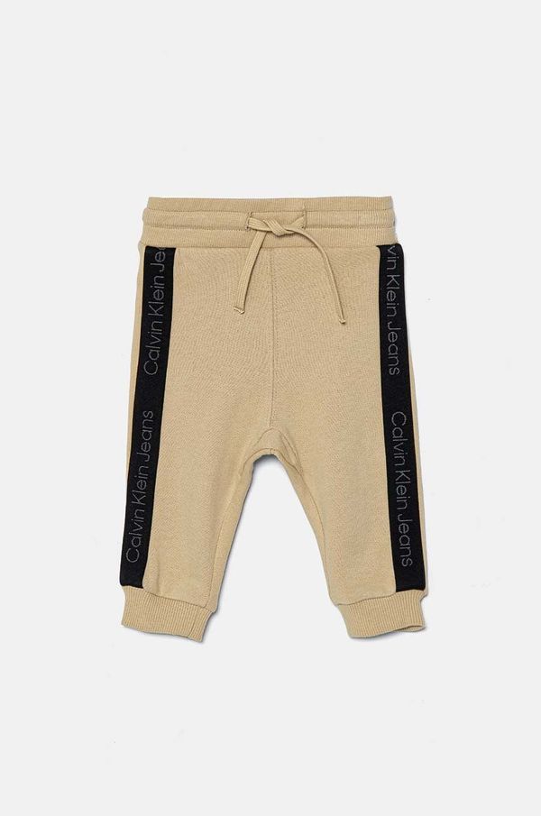 Calvin Klein Jeans Pamučni donji dio trenirke za bebe Calvin Klein Jeans boja: bež, s aplikacijom, IN0IN00194