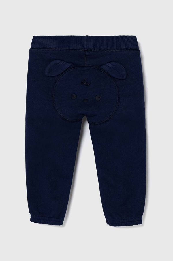 United Colors of Benetton Pamučni donji dio trenirke za bebe United Colors of Benetton boja: tamno plava, s aplikacijom