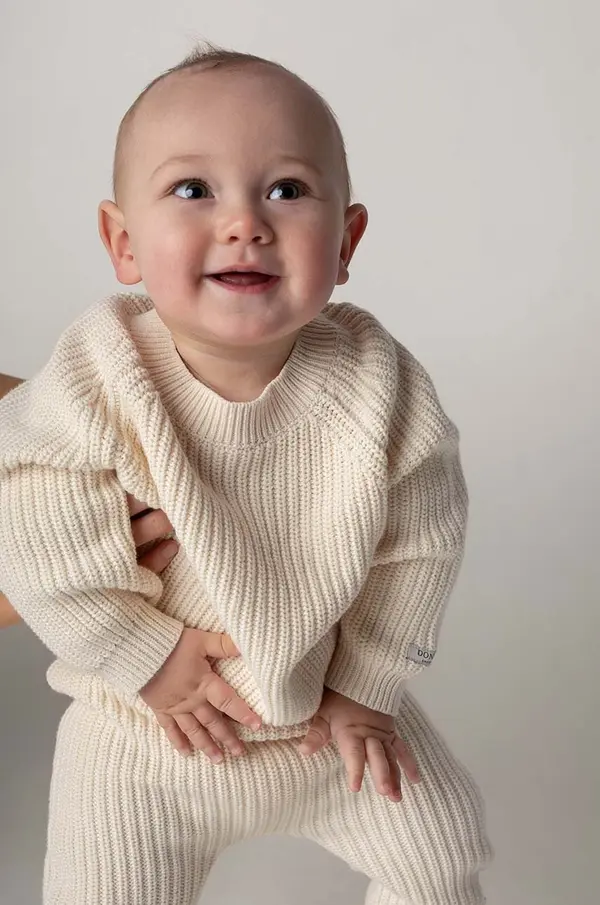 Donsje Pamučni pulover za bebe Donsje Jade Sweater