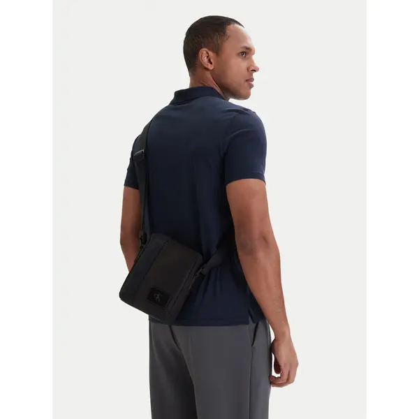 Calvin Klein Crossover torbica Calvin Klein Canvas Mix Reporter LV04D3366G Crna