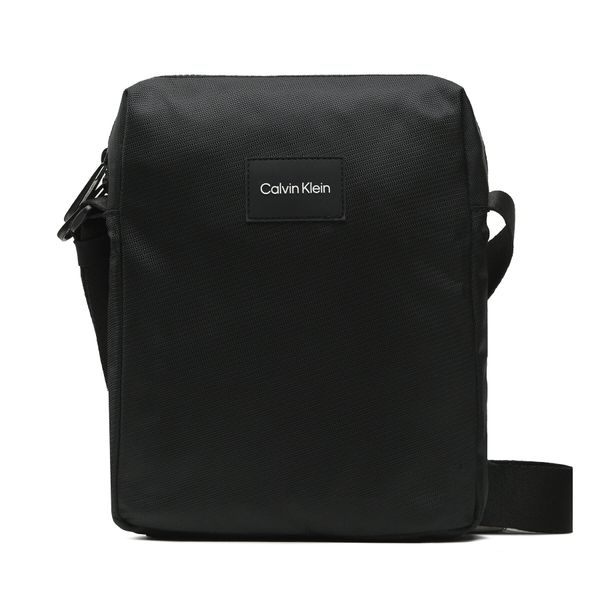 Calvin Klein Crossover torbica Calvin Klein Ck Must T Reporter K50K510259 BAX