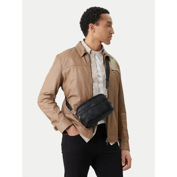Calvin Klein Crossover torbica Calvin Klein Emblem Aop Emboss Camera Bag LV04D3330G Crna