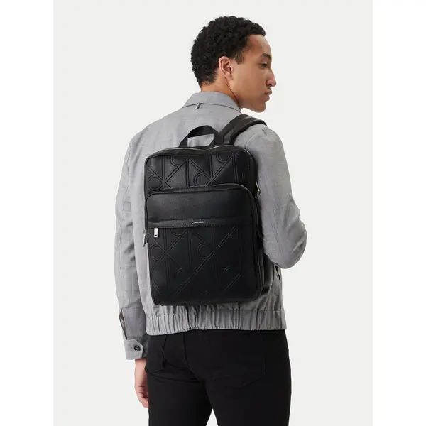 Calvin Klein Crossover torbica Calvin Klein Emblem Aop Emboss Slim Square Bp LV04D3328G Crna