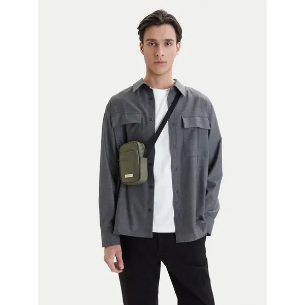 Calvin Klein Crossover torbica Calvin Klein Sleek Slim Reporter LV04D3233G Zelena