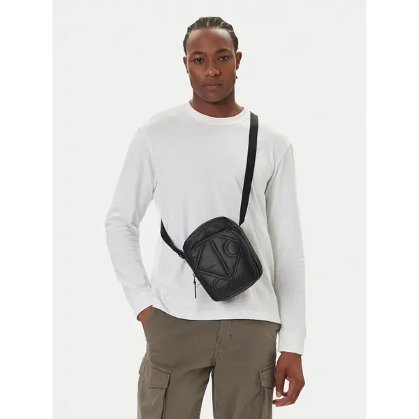 Calvin Klein Torbica oko struka﻿ Calvin Klein Puffer Reporter LV04D3164G Crna
