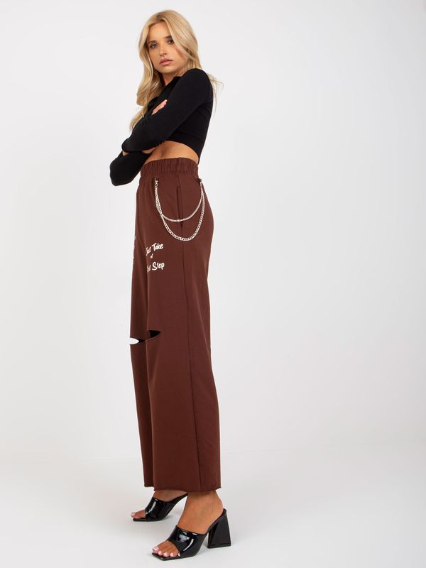 Fashionhunters Dark brown wide sweatpants with chain