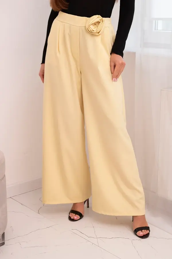 Kesi Włoski Kesi Włoski Women's elegant pants with wide legs and decorative flower yellow