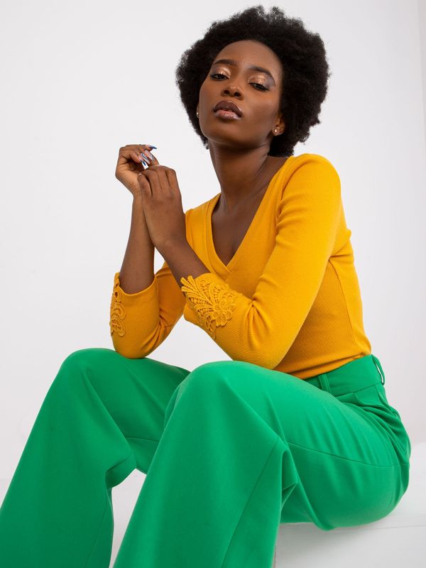 Fashionhunters Khaki dress for a girl with long sleeves