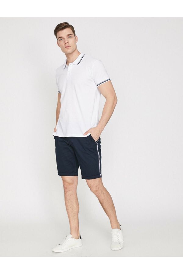 Koton Koton Men's Navy Blue Normal Waist Shorts with Pocket Detail.
