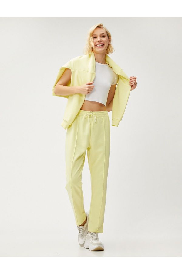 Koton Koton skinny-noged trenirke rebrasti kravata struk.