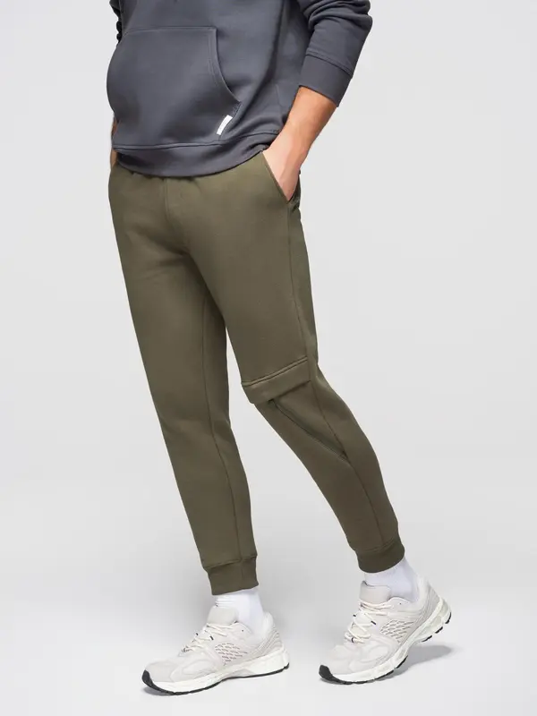 Ombre Ombre Men's sweatpants with stitching and leg zipper - olive