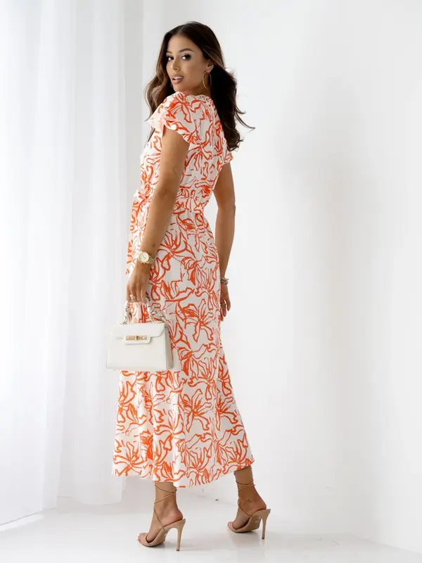 Resti Resti Patterned Women's midi dress with short sleeves, a wrap neckline, and a belt