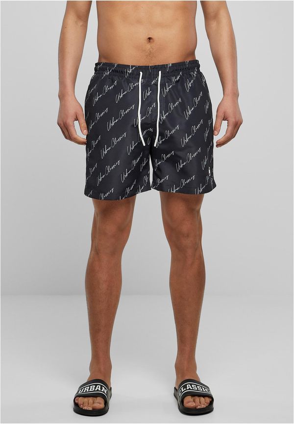 UC Men Swim shorts pattern blackscriptlogo