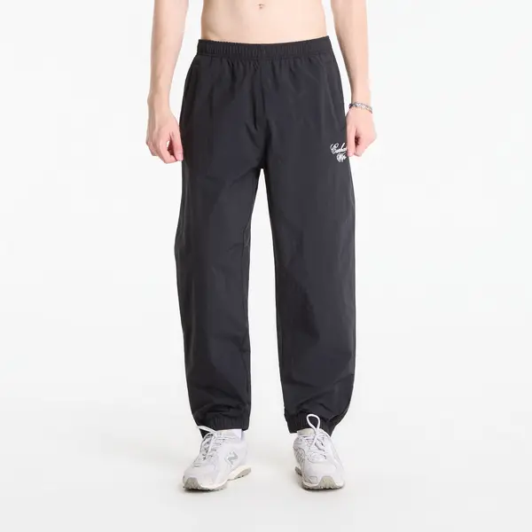 Carhartt WIP Donji dio trenerke Carhartt WIP Travon Pant UNISEX Black/ Wax XXL