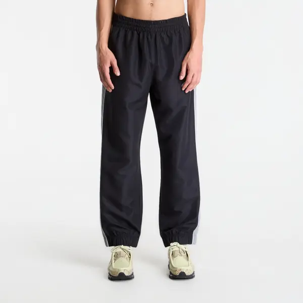 New Balance Hlače New Balance Trackside Woven Pant Black/ Slate Grey XL