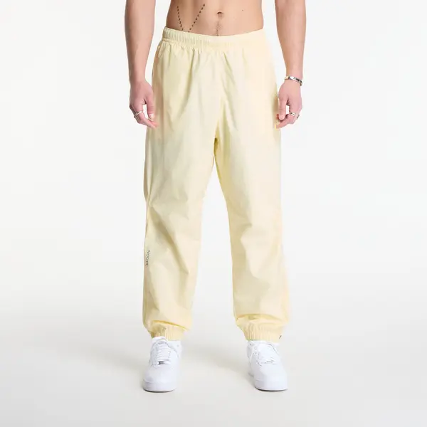 Nike Hlače Nike x NOCTA Northstar Nylon Track Pants Alabaster/ Alabaster/ Stealth XL