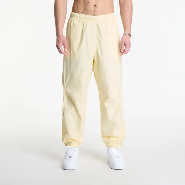 Nike Hlače Nike x NOCTA Northstar Nylon Track Pants Alabaster/ Alabaster/ Stealth XS