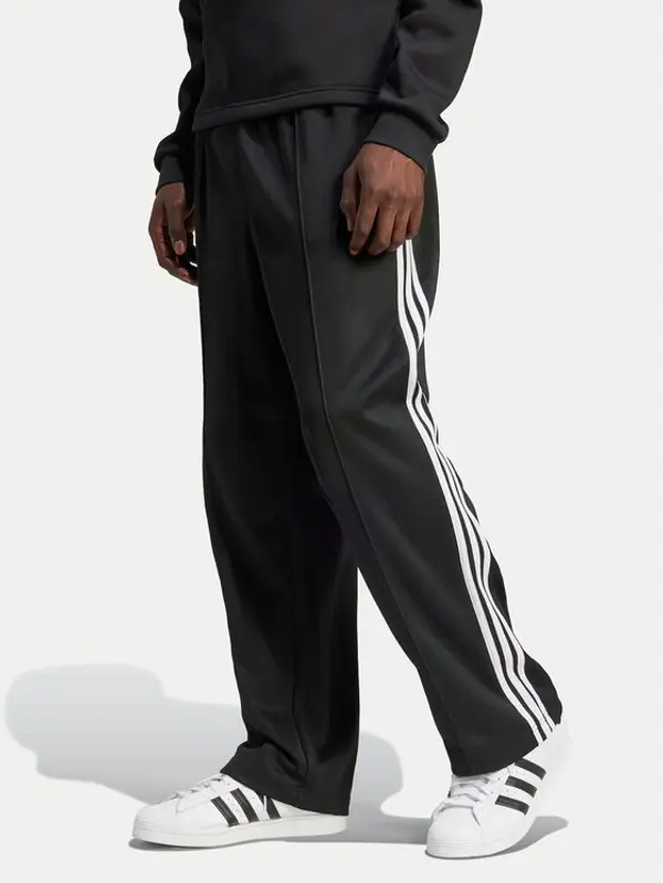 Adidas adidas Donji dio trenerke adicolor Firebird IZ4801 Crna Baggy Fit