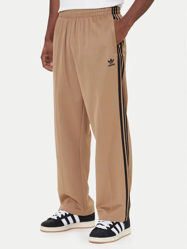 Adidas adidas Donji dio trenerke adicolor Firebird JY1419 Bež Baggy Fit