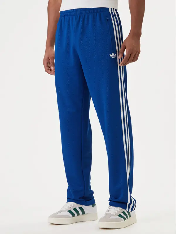 Adidas adidas Donji dio trenerke adicolor Firebird KD4079 Plava Regular Fit