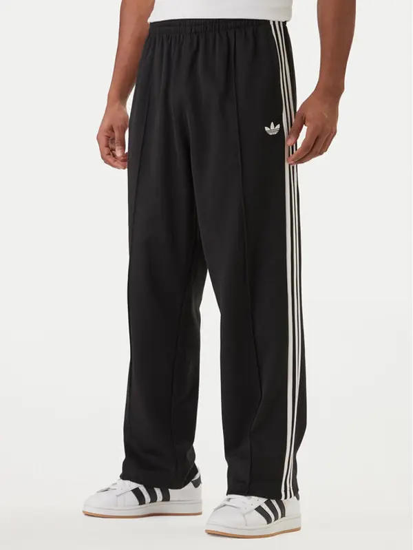 Adidas adidas Donji dio trenerke adicolor KE3501 Crna Loose Fit